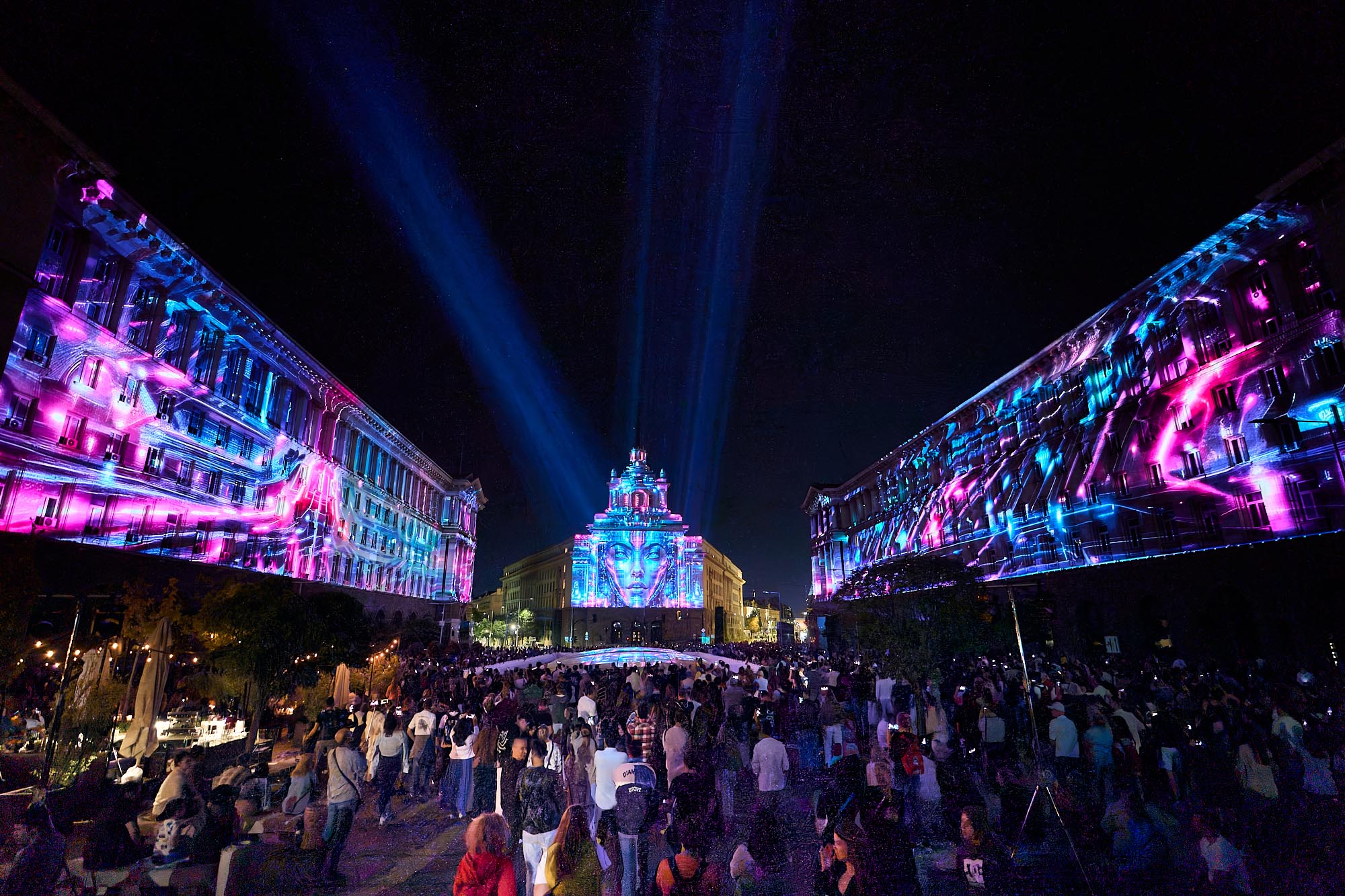 Blue and pink projections across three Largo facades at LUNAR 2026, Sofia